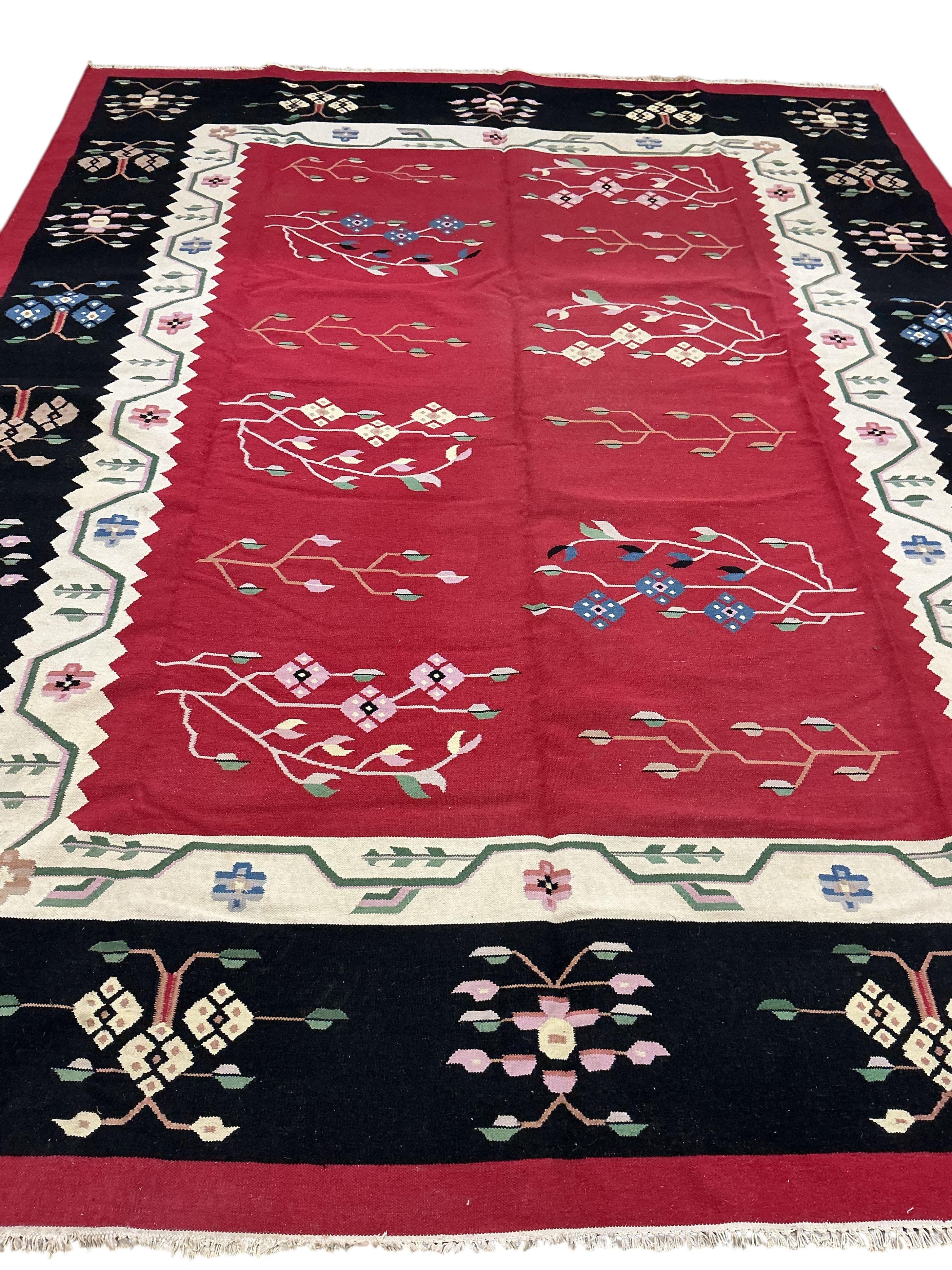 An Arabian design Kilim, 300 x 277cm
